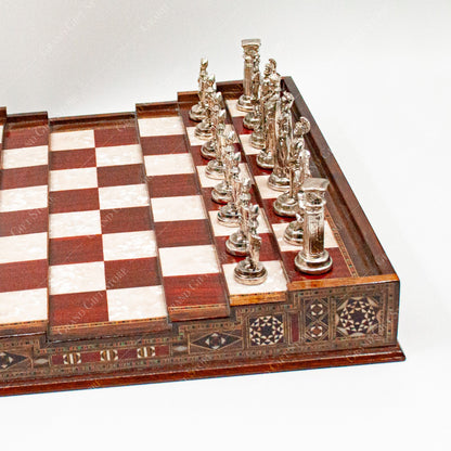 Roman pieces lined up on the arena board
